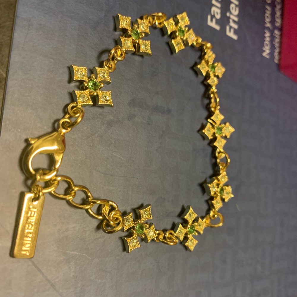 Jewel mint gold tone bracelets.